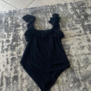 Black one piece.